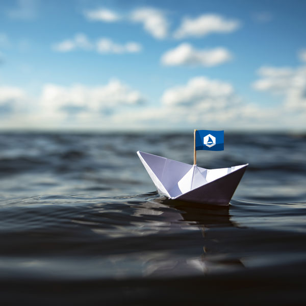 paper boat on an open sea